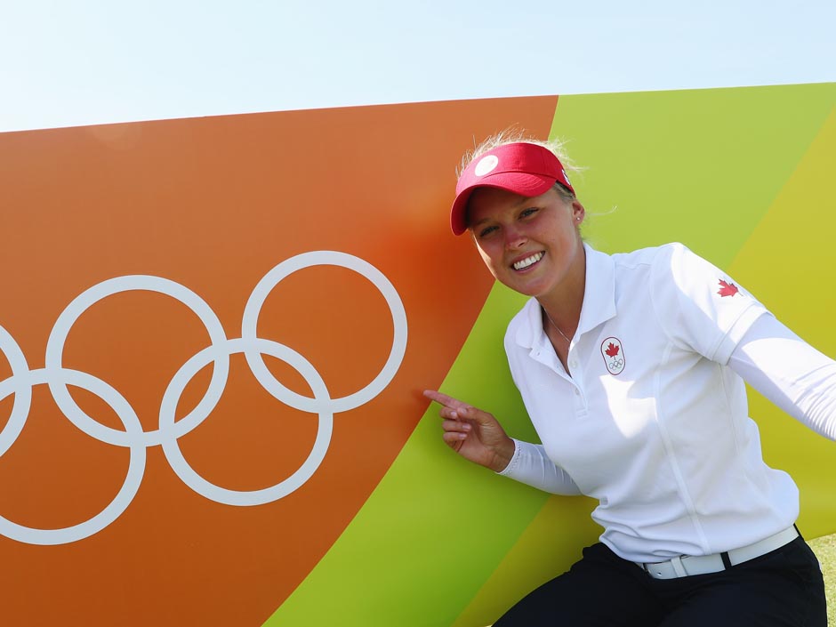 Brooke Henderson poses during a practice round prior to the start of the women's golf tournament during the 2016 Summer Games at the Olympic Golf Course in Rio de Janeiro Brazil on Monday Aug. 15 2016