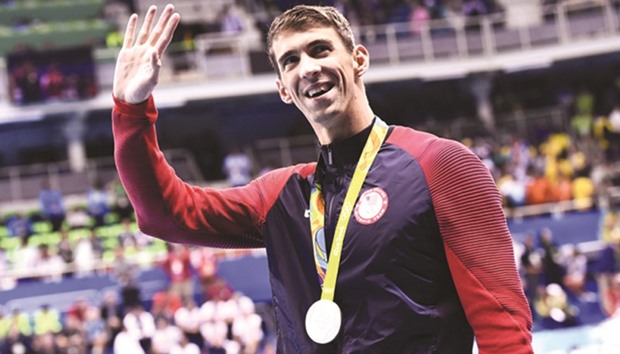 Michael Phelps shares special moment with son after 200 butterfly victory