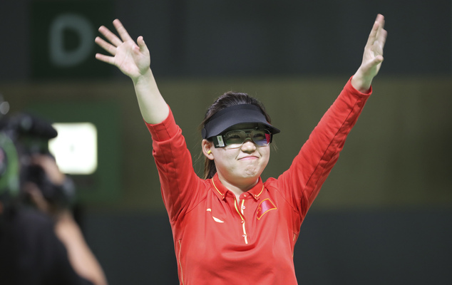 Zhang Mengxue of China celebrates her victory during the women's 10-meter air pistol finals at Olympic Shooting Center at the 2016 Summer Olympics in Rio