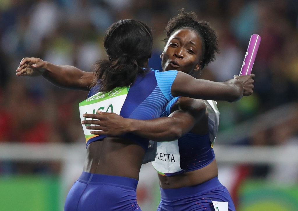 United States's Tianna Bartoletta, right and Tori Bowie celebrate winning the gold medal in the women's 4x100-meter relay final during the athletics competitions of the 2016 Summer Olympics at the