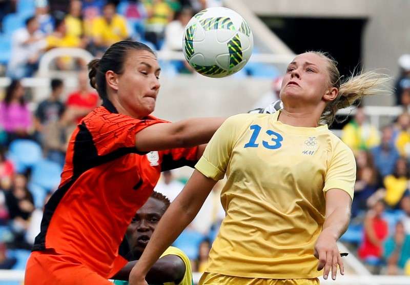 2016 Rio Olympics- Soccer- Preliminary- Women's First Round- Group E Sweden v South Africa- Olympic Stadium- Rio de Janeiro Brazil- 03/08/2016. Goalkeeper Roxanne Barker of South Africa and Fridolina Rolfo of Sweden in action. REUTERS