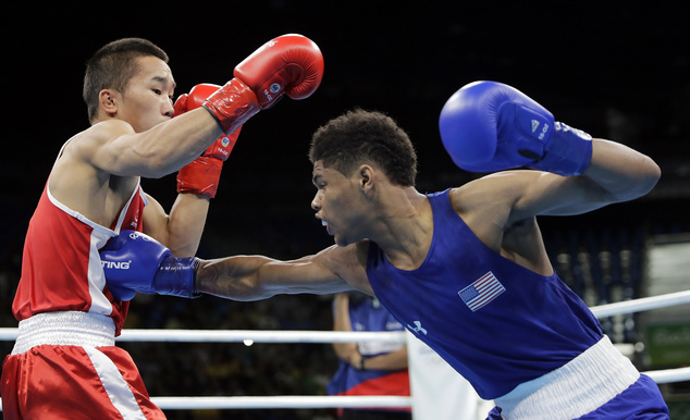 United States Shakur Stevenson right fights Mongolia's Tsendbaatar Erdenebat during a men's bantamweight 56-kg quarterfinals boxing match at the 2016 Summ