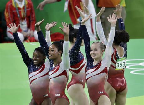 U.S. gymnasts left to right Simone Biles Aly Raisman Gabrielle Douglas and Madison Kocian wave to the audience at the end of the artistic gymnastics women's team final at the 2016 Summer Olympics in Rio de Janeiro Brazil Tuesday Aug. 9 2016