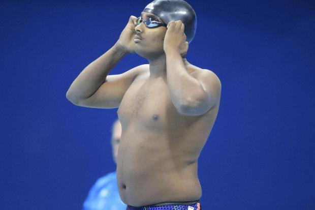 Rio Olympics: Swimmer Robel Kiros Habte shows off his freestyle 'dad bod' in the 100m heats