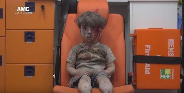 Haunting picture of bloodied Syrian boy (5) sparks outrage around world