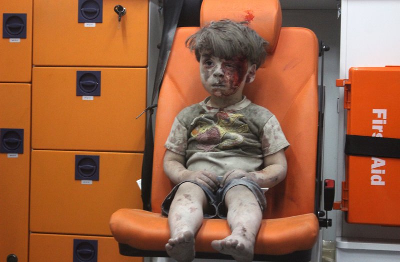 Omran Syrian Boy in Aleppo Bloodied by Airstrike