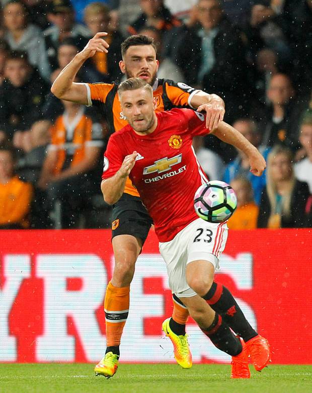 On the ball Manchester United’s Luke Shaw is challenged by Hull’s Robert Snodgrass