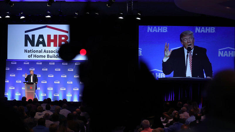 Republican presidential nominee Donald Trump is captured by a TV camera during an address to the National Association of home Builders in Miami Beach Fla. on Thursday Aug. 11 2016