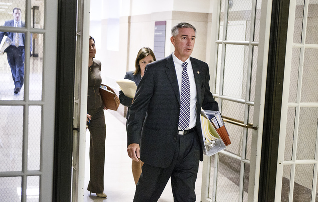 Montgomery County District Attorney Kevin Steele walks into the courtroom on the second day of Pennsylvania Attorney Kathleen Kane's trial at the Montgomery