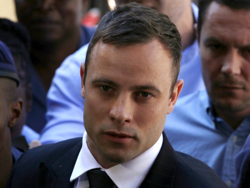 South African Olympic and Paralympic sprinter Oscar Pistorius arrives at the North Gauteng High Court in Pretoria in this