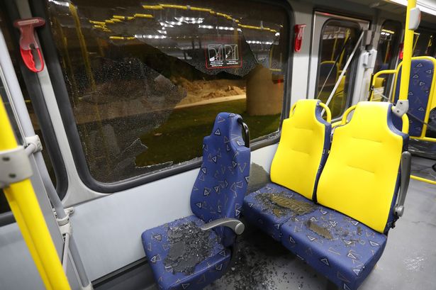 Damage to a media bus in the Deodoro area of Rio de Janeiro