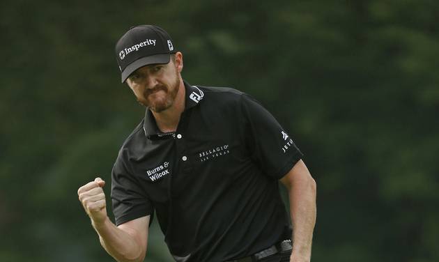 Jimmy Walker reacts to his birdie putt on the 11th hole during the final round of the PGA Championship golf tournament at Baltusrol Golf Club in Springfield N.J. Sunday