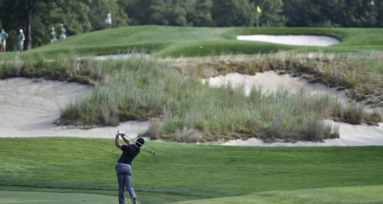 Aug 26 2016 Farmingdale NY USA Rory Mc Ilroy hits his second shot on the fourth hole during the second round of The Barclays golf tournament at Bethpage State Park- Black Course. Mandatory Credit Eric Sucar-USA TODAY Sports