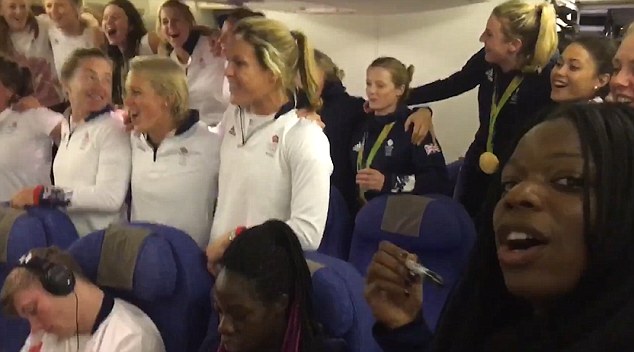 Team GB were clearly in good spirits as they blasted out the national anthem while on the plane home from Rio- although one athlete managed to sleep through the entire thing