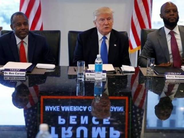 Dr. Ben Carson and Republican presidential nominee Donald Trump and Pierry Benjamin attend a round table with the Republican Leadership Initiative at Trump Tower