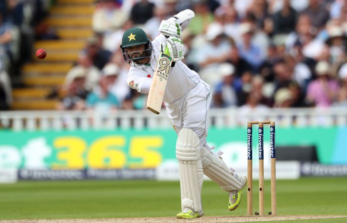 Pakistan batsman Azhar Ali drives the ball during day two of the 3rd Test Match against England at Edgbaston cricket ground in Birmingham England Thursday Aug. 4