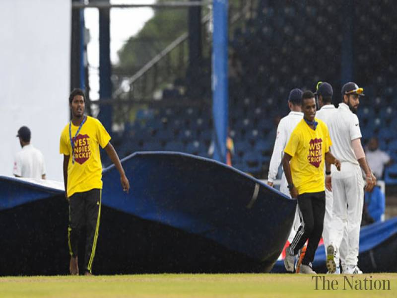 Rain intervenes after India land double blow