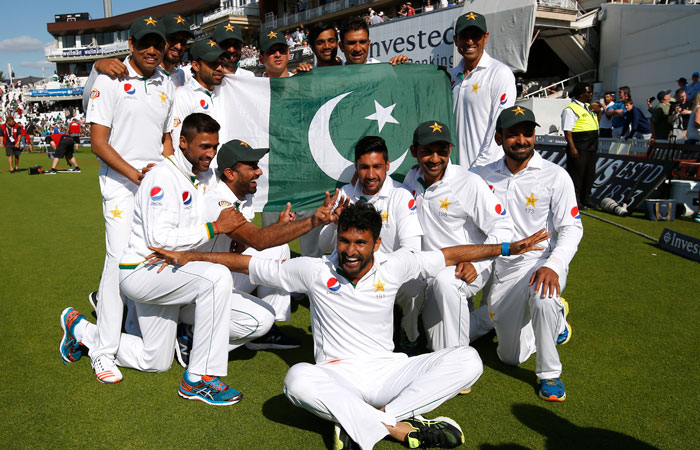 Pakistan players celebrate their win against England after the fourth Test match at the Oval in London Sunday. — Reuters