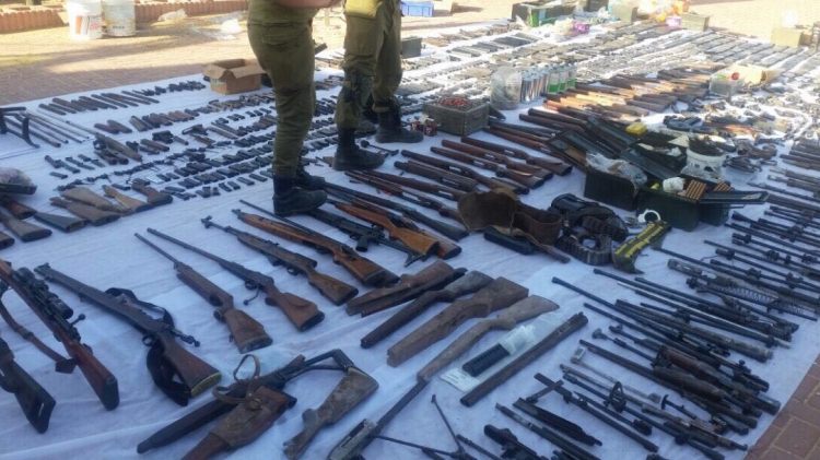 Image released by police showing weapons seized in overnight raids