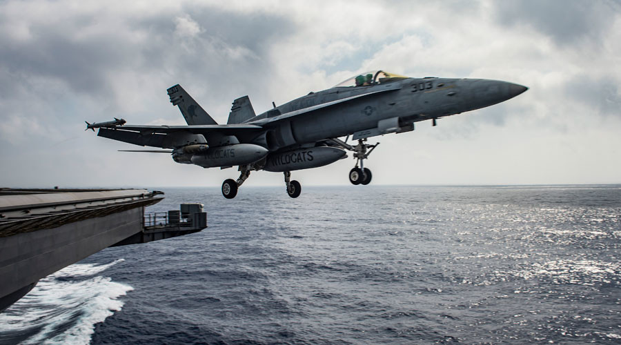 F  A-18E Super Hornet launches from the flight deck of the aircraft carrier USS Dwight D. Eisenhower in the Mediterranean Sea