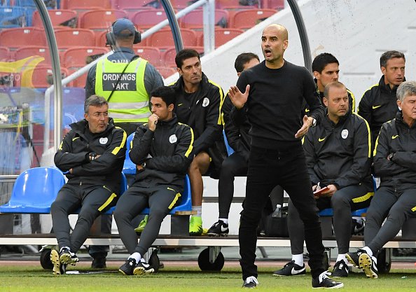 Manchester City's Spanish head coach Pep Guardiola reacts during the friendly football match between Arsenal and Manchester City at the Ullevi stadium in Gothenburg