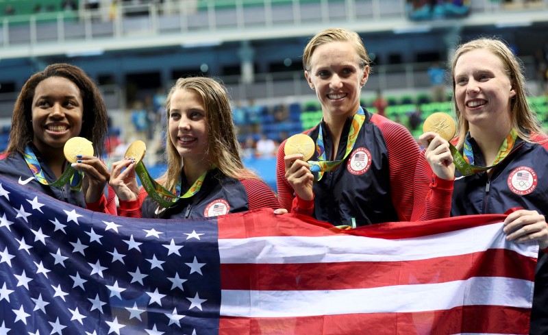 2016 Rio Olympics- Swimming- Victory Ceremony- Women's 4 x 100m Medley Relay Victory Ceremony- Olympic Aquatics Stadium- Rio de Janeiro Brazil- 13/08/2016. Gold medallists Kathleen Baker of USA Lilly King of USA Dana Vollmer (USA