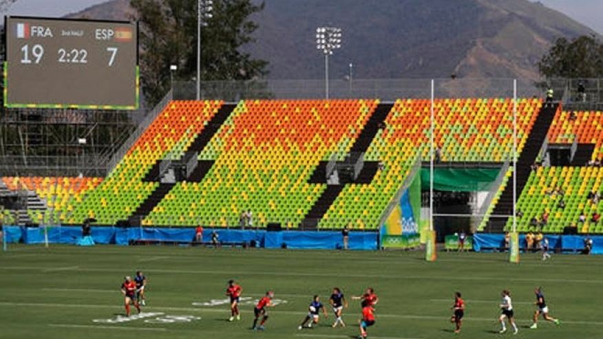 Seats sit empty during the second half of the inaugural women's rugby match between France and Spain at the Summer Olympics in Rio de Janeiro Brazil Saturday Aug. 6 2016