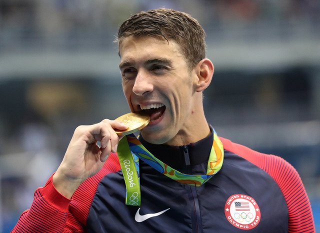 ASSOCIATED PRESS           United States’ Michael Phelps celebrates winning the gold medal in the men’s 4x200-meter freestyle relay during the swimming competitions at the 2016 Summer Olympics Wednesday Aug. 10 2016 in Rio