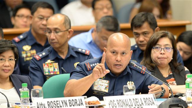 Philippine National Police Chief Roland dela Rosa testifies at a senate inquiry into a wave of drug-related killings