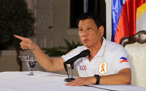 Philippines President Rodrigo R Duterte gestures at a press conference where he threatened to have the country leave the United Nations