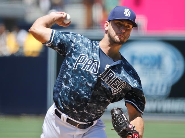 San Diego Padres starting pitcher Jarred Cosart works against the Philadelphia Phillies in the first inning of a baseball game Sunday Aug. 7 2016 in San Diego