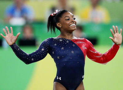 RIO DE JANEIRO BRAZIL- AUGUST 07 Simone Biles of the United States competes on the floor during Women's qualification for Artistic Gymnastics on Day 2 of the Rio 2016 Olympic Games at the Rio Olympic Arena