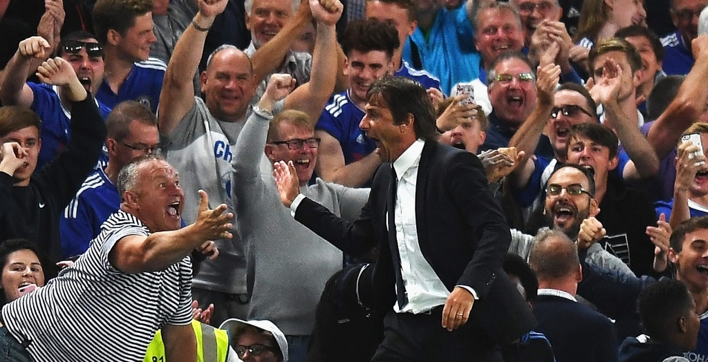 LONDON ENGLAND- AUGUST 15 Antonio Conte Manager of Chelsea celebrates the goal scored by Diego Costa of Chelsea during the Premier League match between Chelsea and West Ham United at Stamford Bridge