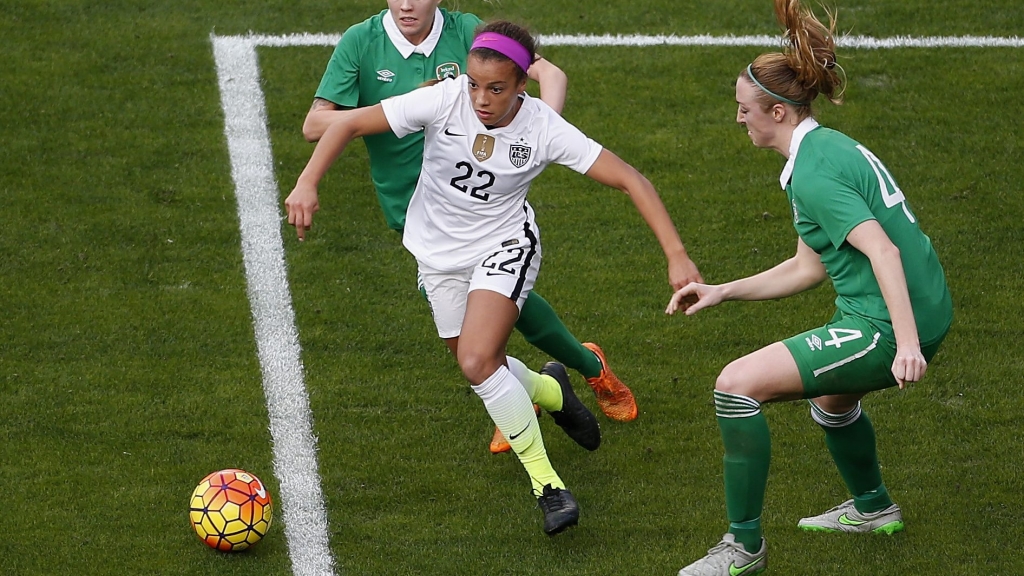 SAN DIEGO CA- JANUARY 23 Mallory Pugh #22 of the United States is defended by Denise O'Sullivan #10 and Louise Quinn #4 of Ireland as the United States won 5-0 at Qualcomm Stadium