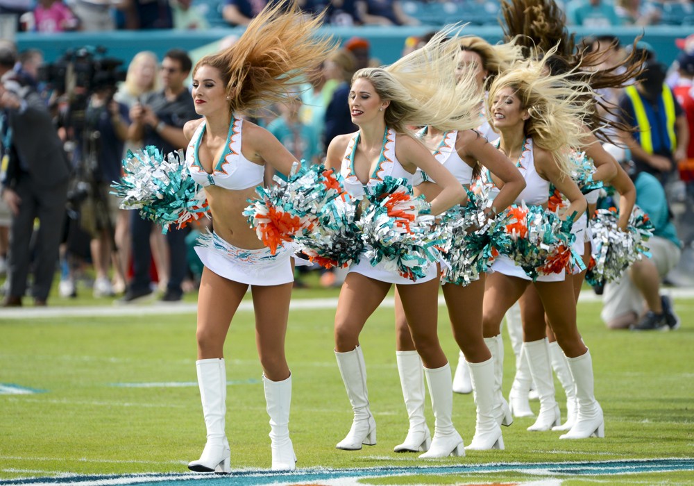 03 January 2016 Miami Dolphins cheerleaders perform during the NFL football game between the New England Patriots and the Miami Dolphins at the Sun Life Stadium in Miami Gardens Florida