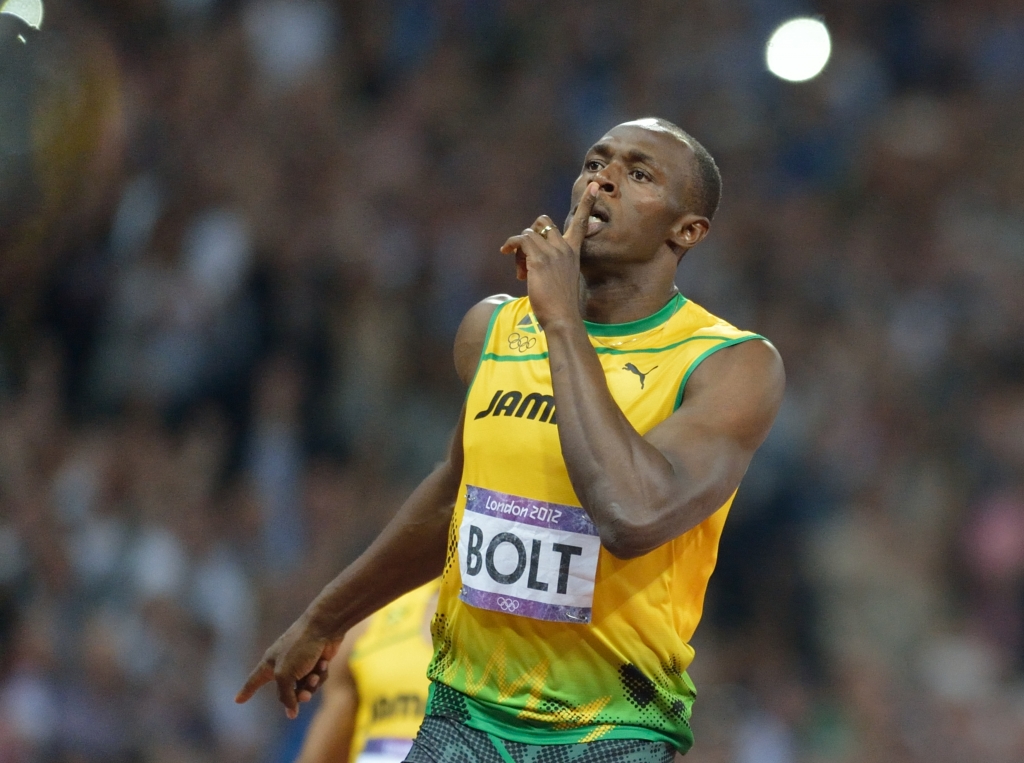 Jamaica's Usain Bolt reacts after winnin