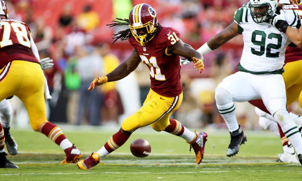 19 August 2016 Washington Redskins running back Matt Jones fumbles the ball during a match between the Washington Redskins and the New York Jets at FedExField in Landover Maryland