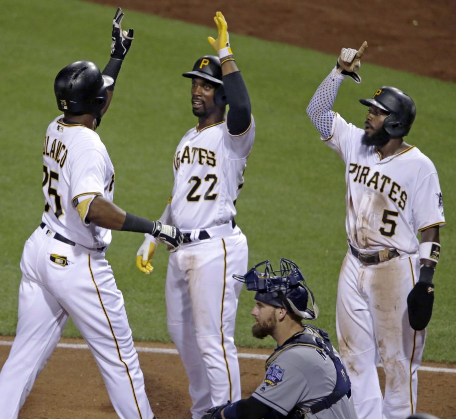 Pittsburgh Pirates&#039 Gregory Polanco left is greeted by teammates Andrew Mc Cutchen, and Josh Harrison after hitting a three-run home run off San Diego Padres starting pitcher Luis Perdomo in the fifth inning of a baseball game in Pittsburgh