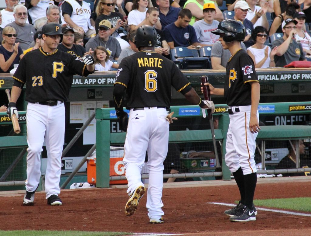 Starling Marte going into dugout