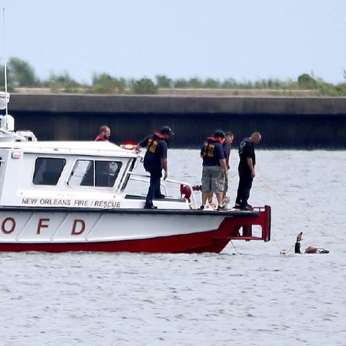 Crews to retrieve plane from lake; 2 men still missing