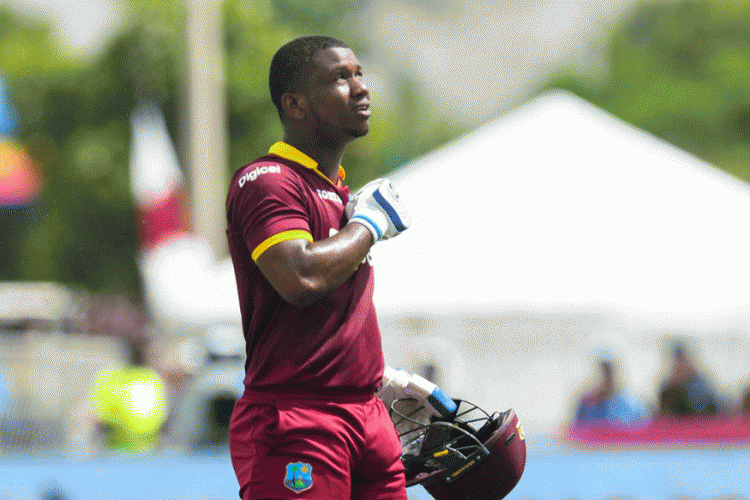 Playing just his second T20I Evin Lewis scored a 49-ball 100 against India