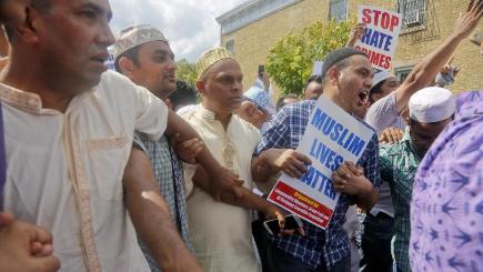 Mourners near the site of the killings of Imam Maulama Akonjee and Thara Uddin after funeral services for both men