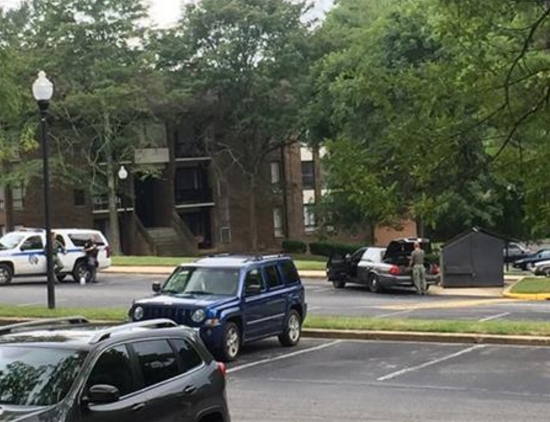 Authorities respond to the scene in Randallstown MD. Monday Aug. 1 2016. Baltimore County police say officers have shot and killed a woman who barricaded herself and a child inside a suburban Baltimore apartment and pointed a gun at them. (Maya Earls  T