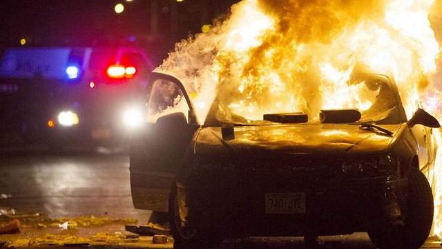 Police car burning Milwaukee