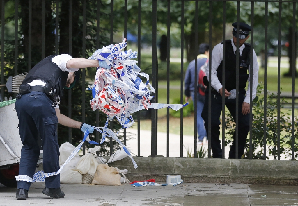 Police clear barricade tape from Russell Square in London