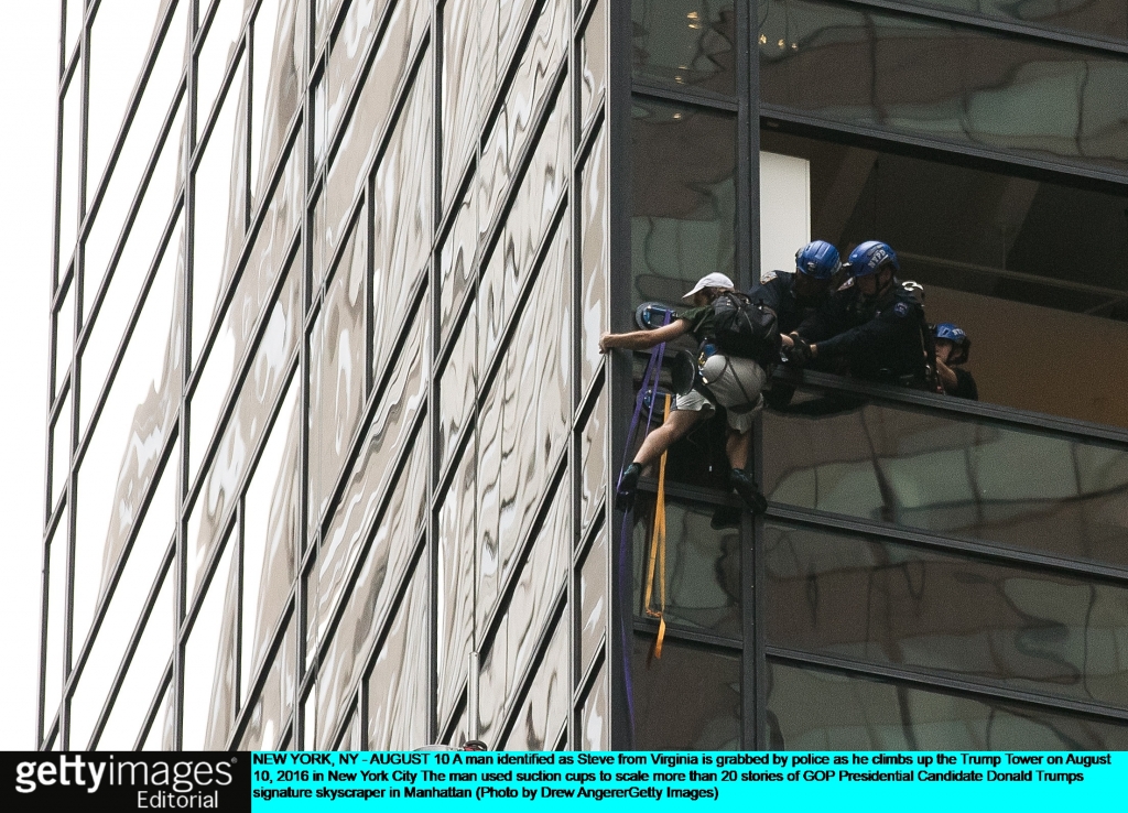 Police grab Stephen Rogata as he reaches the 21st floor of Trump Tower Drew Angerer  Getty Images