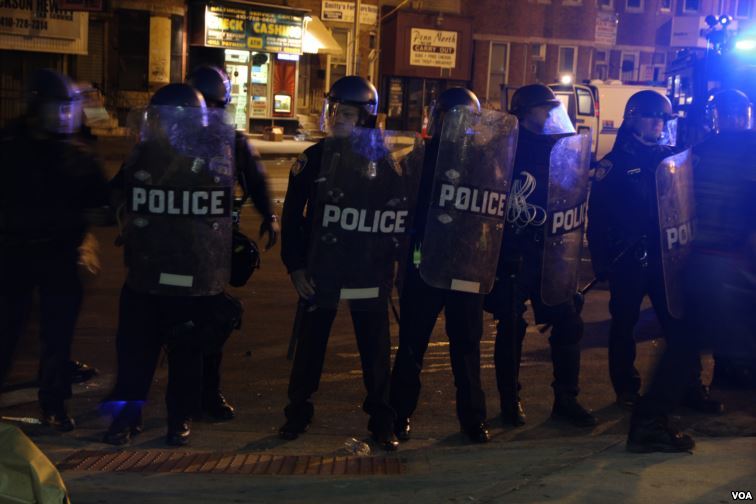 Police stand watch during the Baltimore riots