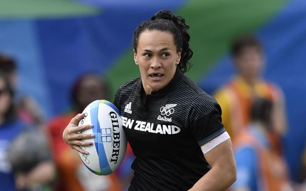 New Zealand's Portia Woodman runs with the ball in the women’s rugby sevens semi-final match between Britain and New Zealand