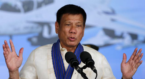 President of the Philippines Rodrigo Duterte speaks inside a military airbase in Angeles City east of Manila