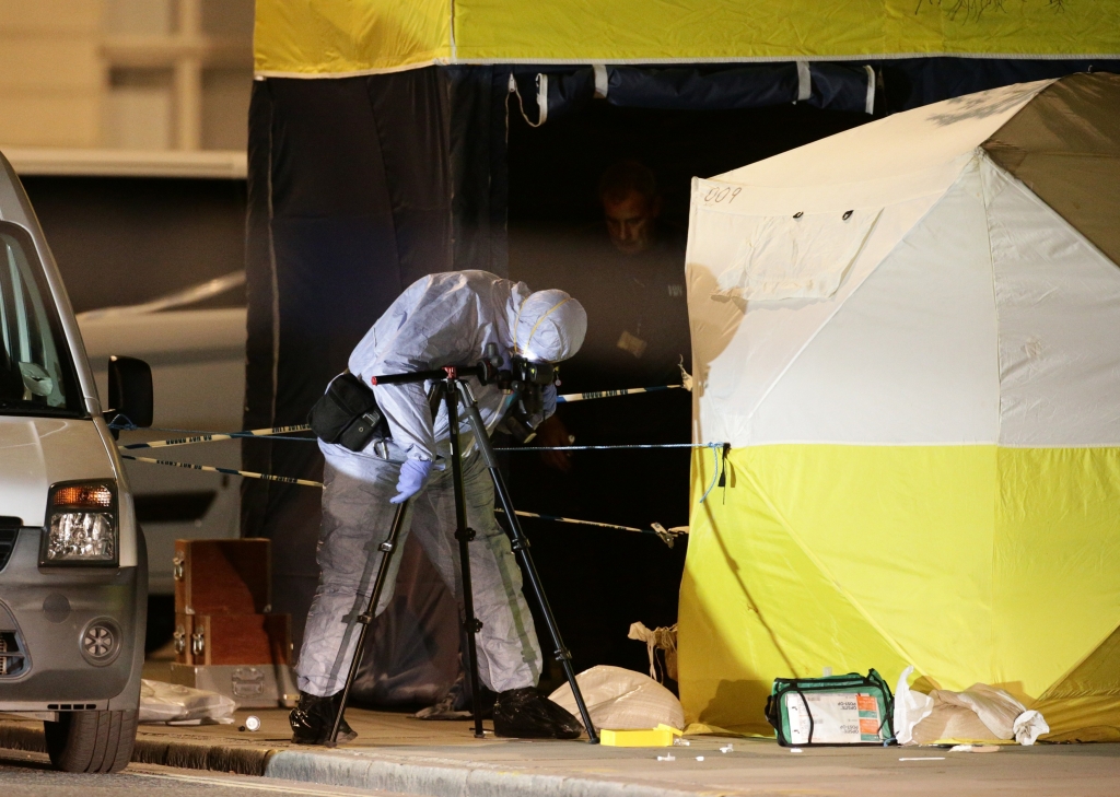 A police forensic officer at work in Russell Square